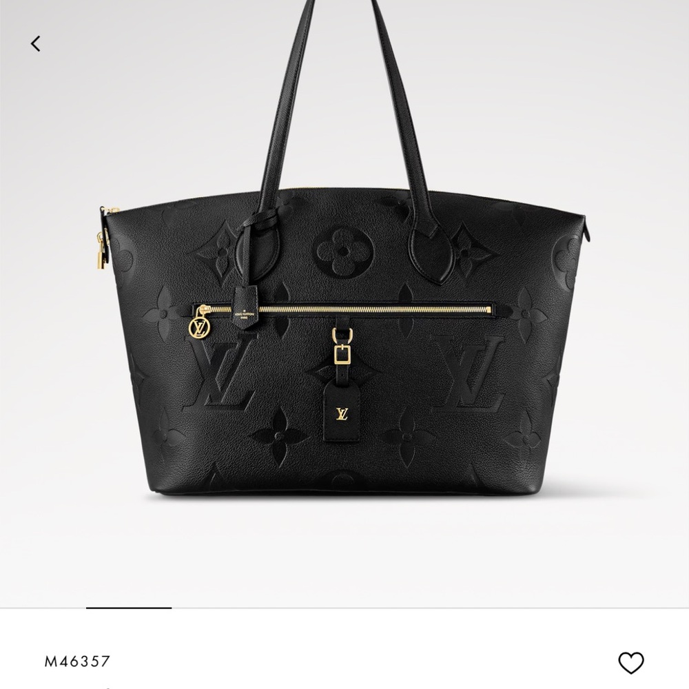 Louis Vuitton Black Travel Bag with Textured Leather and Gold Accents